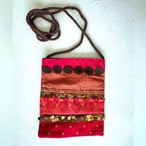 Assorted fabric & ribbon trimmed shoulder crossbody bag.